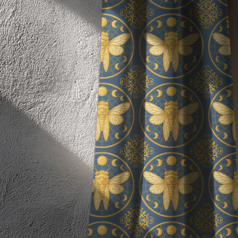 A single panel of a heavyweight blackout curtain with a rich, satiny texture. The design features a repeating pattern of large, golden cicadas, each framed within a celestial moon phase circle on a dark charcoal background. This moody entomology and lunar art is ideal for Dark Academia, Gothic, and Witchy interior aesthetics, providing both a dramatic statement piece and functional light-blocking for a bedroom, library, or living room.